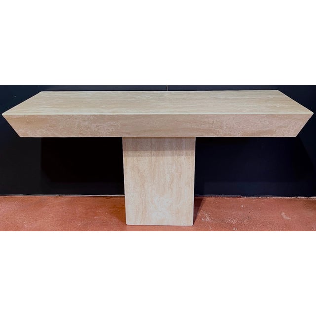 1970s Italian Modern Sculptural Travertine console Italy, 1970s A substantial console table, constructed in two parts, the...
