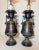 Up for sale is a very high quality pair of antique Egyptian Revival figural urn style table lamps. These urns are in the...
