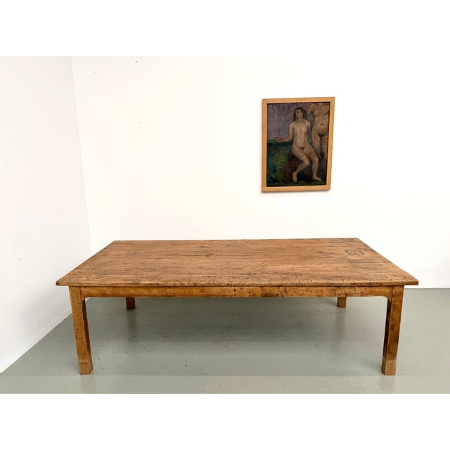 Maison Lecan presents this large 1950s farmhouse table in solid oak, a statement piece with a strong character and...
