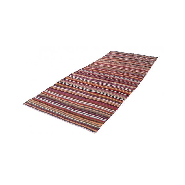 Handwoven vintage striped decorative kilim rug from Denizli region of Turkey. Approximately 50-60 years old. In very good...