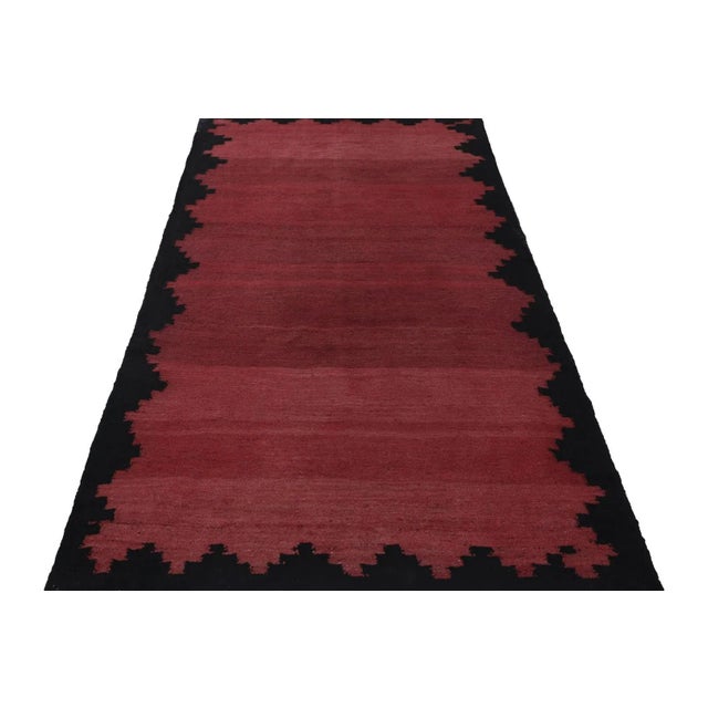 Made with handwoven wool circa 1950-1960, this 5x10 vintage Bidjar Kilim is a particularly bright and sought-after work of...