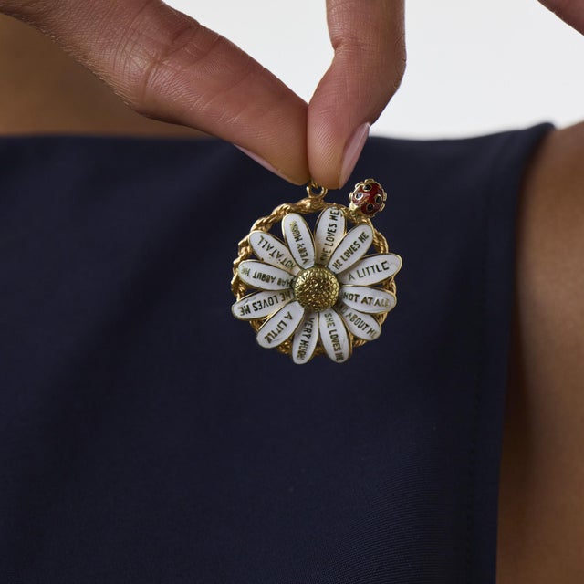 This sweet vintage daisy pendant is a playful and romantic 1980’s design, crafted in 14k yellow gold with enamel detail....