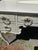 Charming White Painted Wood Vanity With Oval Mirror For Sale - Image 14 of 17