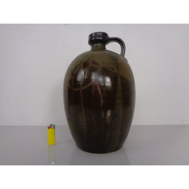 Signed studio ceramic vase from the 1960s. Signature on the bottom of the vase. Probably from Germany.