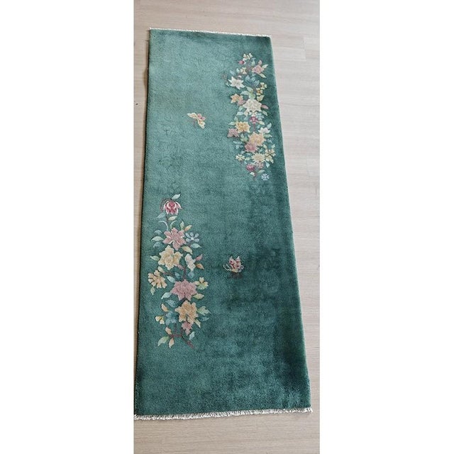 Green Color Antique Art Deco Chinese Small Scatter Size Throw Rug (2.02ft x 6ft), Circa Date: 1920s. This exquisite piece...