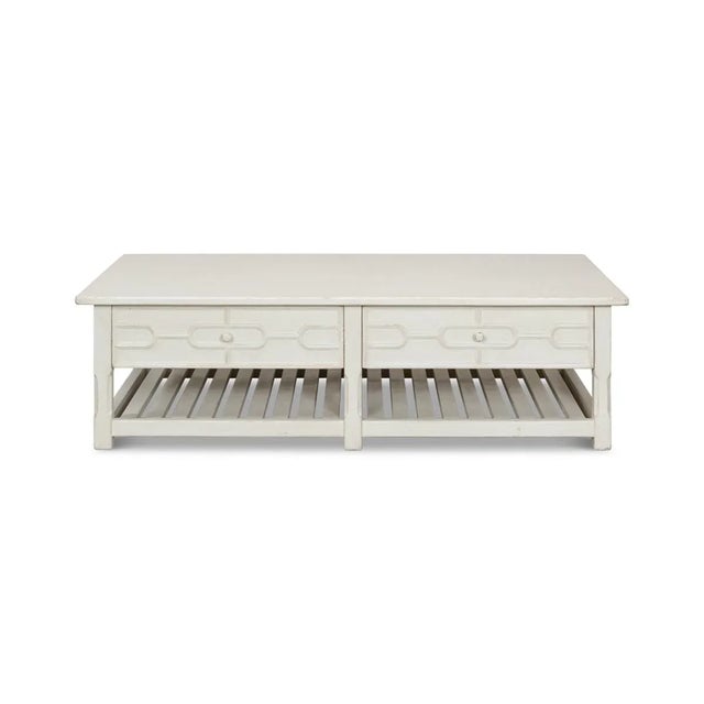 Painted Trellis Coffee Table in an antiqued white painted finish. Versatile and eye-catching with trellis details...