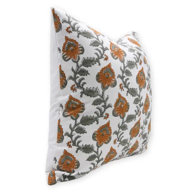 Bring warmth and artistry into your space with this block print handmade cushion cover. Crafted from thick white cotton,...