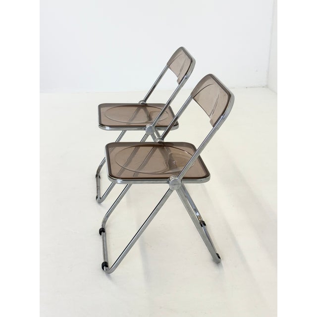 Vintage Plia Folding Chairs by Giancarlo Piretti for Anonima Castelli, 1970s, Set of 2, in Good conditions. Designed 1970...