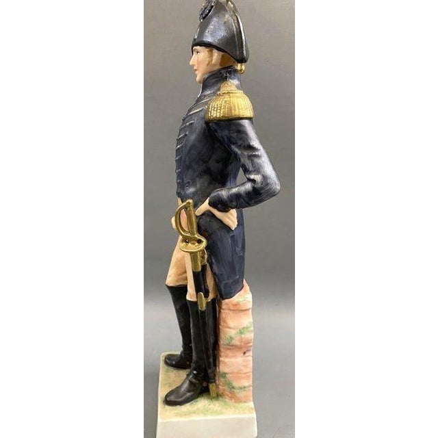This striking hand-painted porcelain figurine by Andrea by Sadek depicts a U.S. Army General Staff Officer from 1814, and...