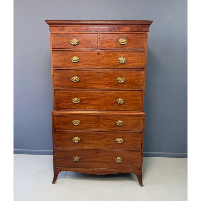 A finely proportioned American Federal period chest on chest, crafted in richly figured mahogany and dating to circa 1800....