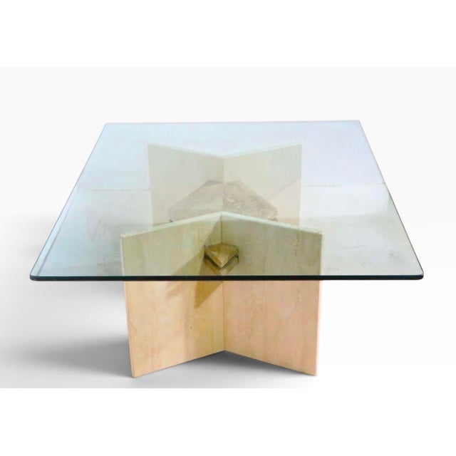 Post Modern marble base, glass top coffee table, made in Italy circa 1970/80's. The table features a two tone geometric...