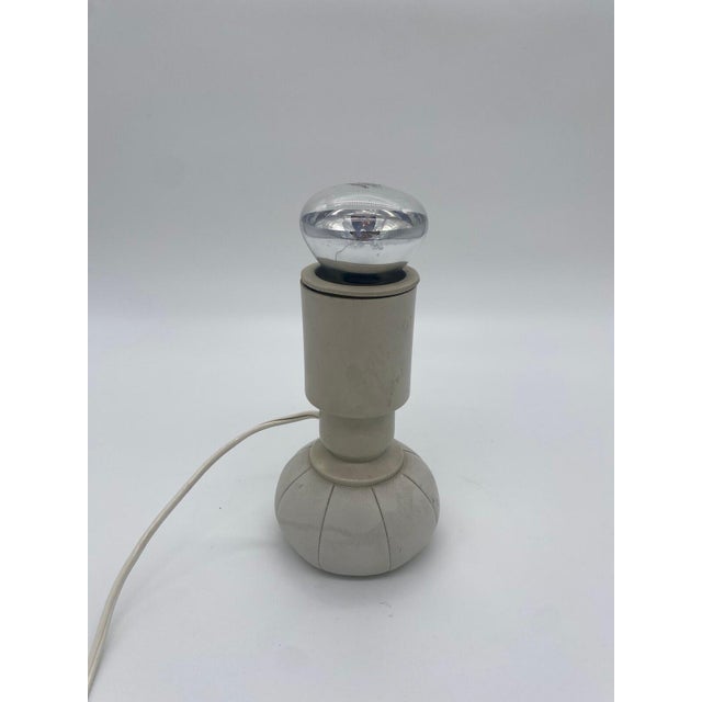 Mid-Century Table Lamp Model 600 by Gino Sarfatti for Arteluce - 1966. This piece is attributed to the mentioned...