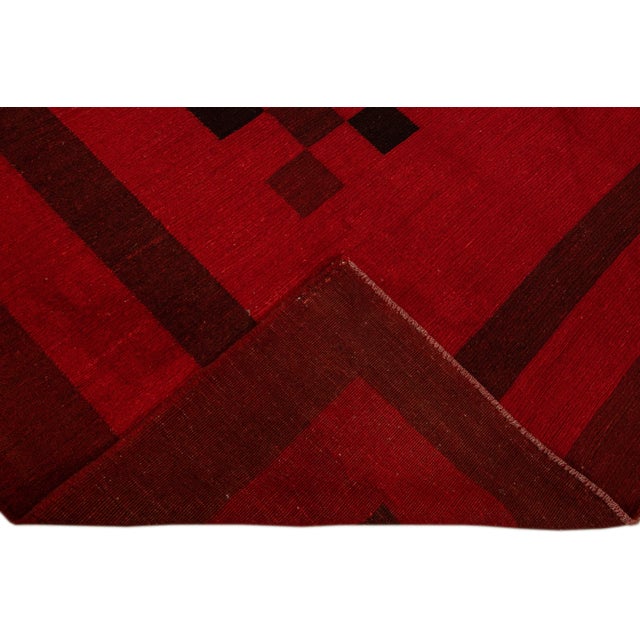 Beautiful modern Kilim flat-weave wool rug with a red field layout in a gorgeous chess pattern design. This rug measures:...