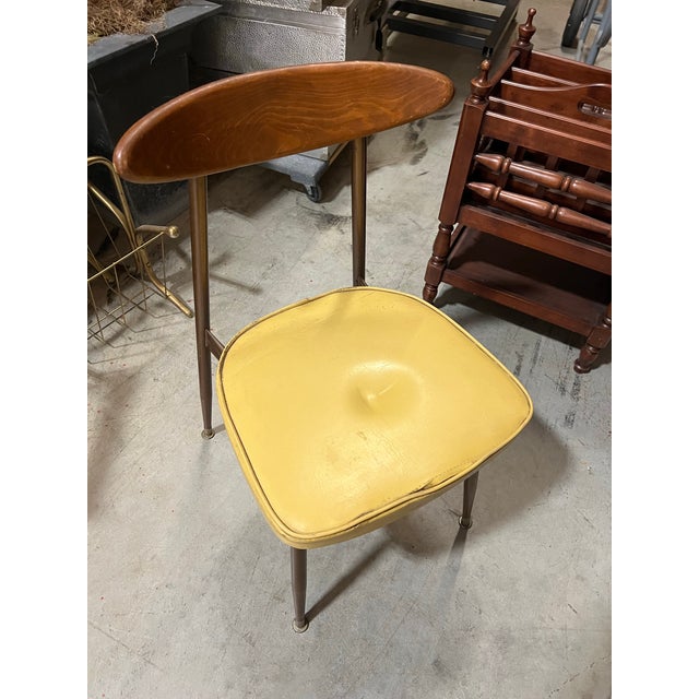 Up for consideration is a beautiful vintage wooden mid century modern wood chair with a yellow leather cushion. This is a...