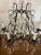 Early 20th Century French Louis XV Style Six Light Bronze or Brass Chandelier With Abundance of Cut Crystal Prisms For Sale - Image 11 of 12