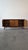 DESCRIPTION: This is a classic mid century modern console by Garrison Furniture Co., combining clean lines, warm walnut...