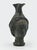 Bronze jug is an original objectrealized by anonymous artist in the early 20th Century. A jug realized in ancient manner,...