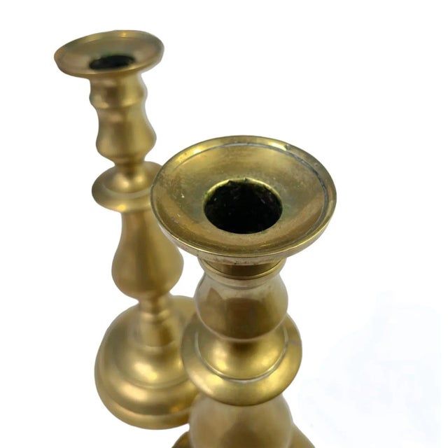 Add some elegance to your tabletop or mantel with this identical pair of mid 19th century English candlesticks in a...