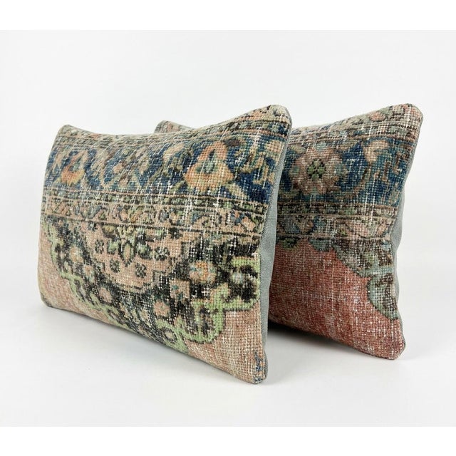 This beautiful 16'' x 24'' pillow cover set was made from authentic Turkish rug pieces. Bright colors of wool adorn the...
