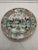 A colorful Chinese decorative plate, or dinner plate, painted in the 'rooster design' which was popular in the early 18th...