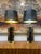 Chic pair of black and gold Pierre Cardin style table lamps. The elegant lamps are unmarked, but look to be Italian made....
