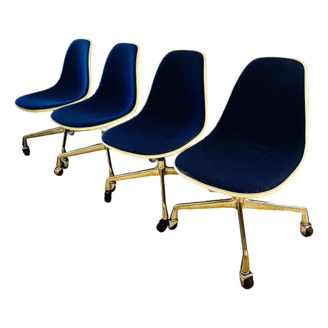 1960's Fiberglass and Blue Fabric Swivel Chairs by Eames for Herman Miller - Set of 4 For Sale