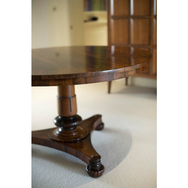 Beautiful original 19th Century English Regency Rosewood centre table with a stunning wood grain and polished finish. This...