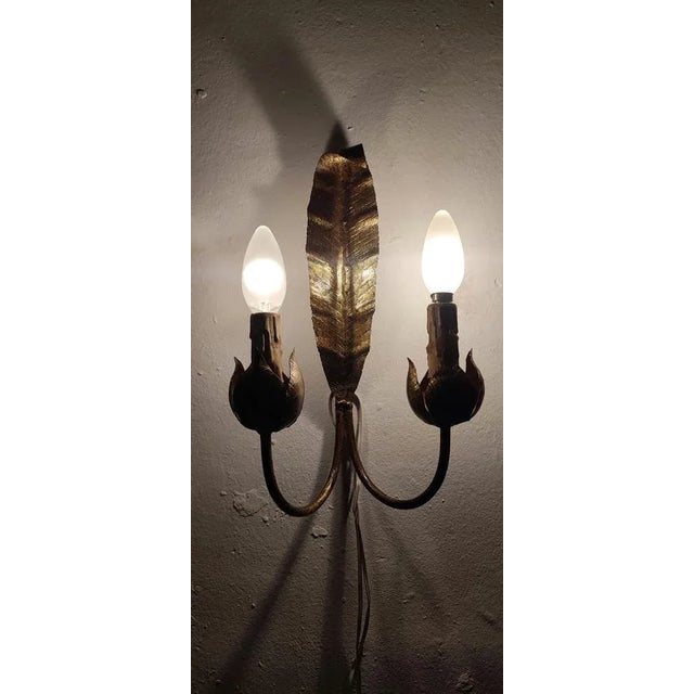 Wrought Iron and Gold Leaf Wall Light, Spain, 1970s, in Very Good conditions. Designed 1960 to 1969 European Plug (up to...