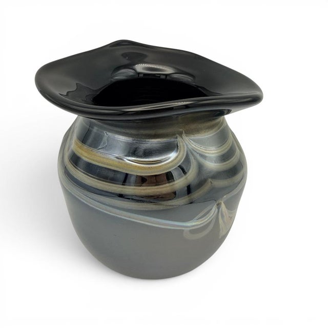 An exceptional signed studio glass vase from the renowned Eisch glassworks in Frauenau, in the Bavarian Forest. The...