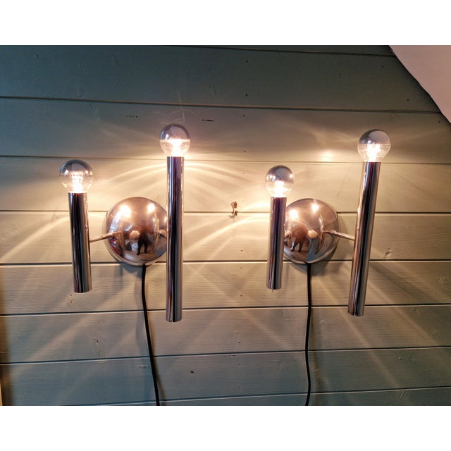 Pair of tubular wall sconces in chromed metal, designed by gaetano sciolari, space age style, 1970s. sconces compatible...