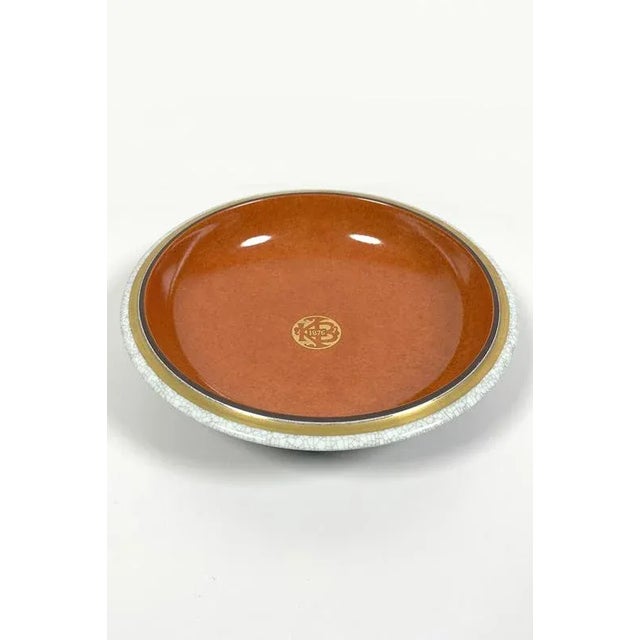 Royal Copenhagen plate made for the municipality of Frederiksberg. This deep plate is part of the "Crackled Porcelain"...