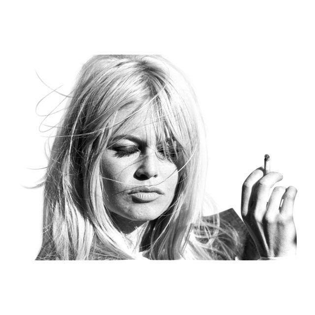 Brigitte Bardot with cigarette in hand by photographer Michael Ochs As an authorized Getty Images Gallery partner, we...