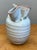 This vintage studio pottery vase is an exquisite example of organic modernism, defined by its hand-thrown silhouette and...