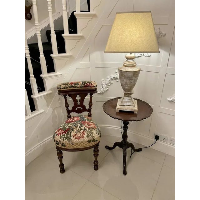 Unusual antique Victorian oak side chair having an upholstered lift up top to reveal a storage compartment above a shaped...