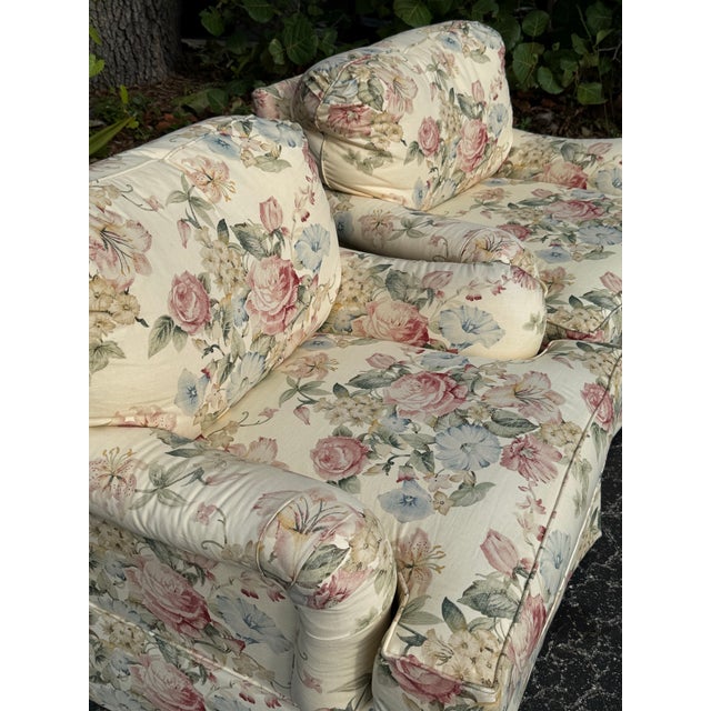 Beautiful pair of Thomasville overstuffed lounge chairs featuring a classic floral upholstered pattern and generously...