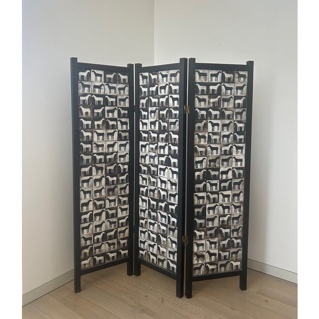 One-of-a-kind room divider featuring hand-painted horse tiles. Three panel divider is black on reverse. Heavy and solid...