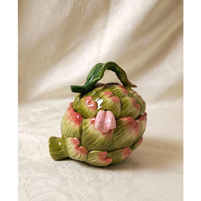 This vintage three-piece majolica ceramic condiment sugar bowl set represents the whimsical, high-relief naturalist...
