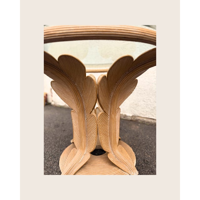 Stunning decorative Centre table or dining table with pencil reed in a bellflower design and glass top.