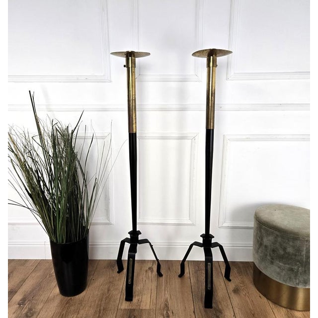 Pair of tall floor candle holders