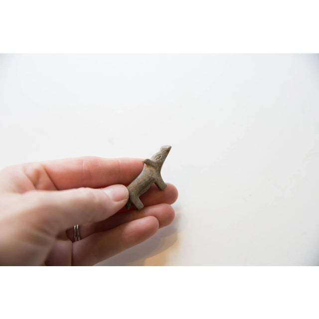 :: Vintage African mini hippo. As this item is in vintage condition, it may show signs of age and use. Date made estimated...