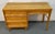 Add timeless functionality and classic design to your workspace with this mid-century modern writing desk by Morris of...