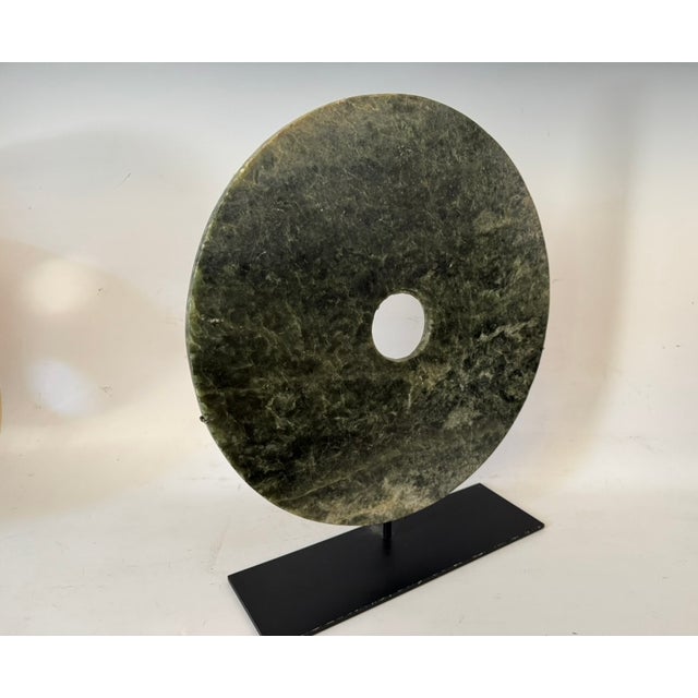 re, 3200-2300 BCE Jade 16.5" x 16.5" Mounted on steel base. Each have been examined by one or more relevant experts in the...