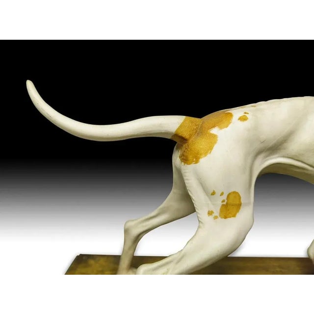 Old porcelain pointer early 1900 excellent condition. Measures: 30 X 15 X 17 cm. This piece is attributed to the mentioned...