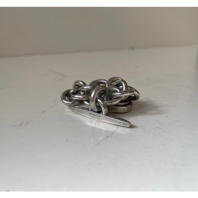 140 grams of solid silver bracelet made during the 1970s by the danish silversmithy randers sølvvarefabrik. Stylistically...