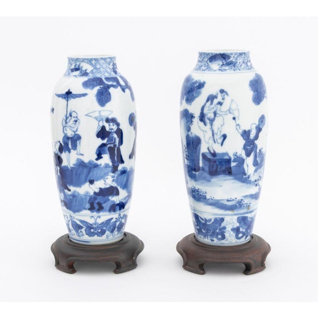 Near Pair of Chinese Blue and White Porcelain Vases, each hand-painted with figural scenes, one with blue underglaze four...