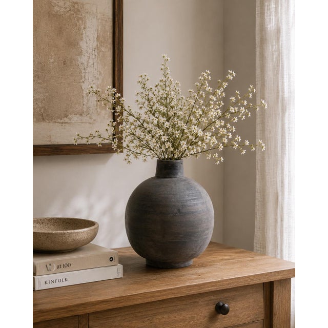 Introducing Contemporary Gray Ceramic Earthy Round Pottery Vase! Handmade in China, each piece is unique, showcasing...