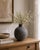 Introducing Contemporary Gray Ceramic Earthy Round Pottery Vase! Handmade in China, each piece is unique, showcasing...