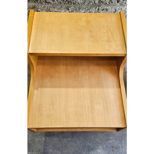 Beautiful matching pair of Mitchell Gold + Bob Williams nightstands, featuring a warm natural wood finish, clean modern...