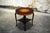 Handsome Swedish Art Deco side table of dark flame birch and golden elm. Beautiful gradient top trimmed with contrasting...