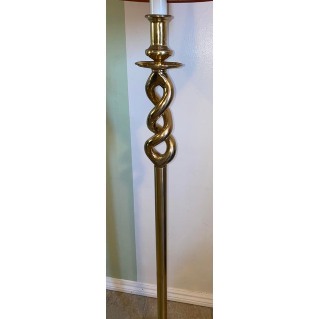 Beautiful 1970’s twisted brass floor lamp with burnt orange shade.